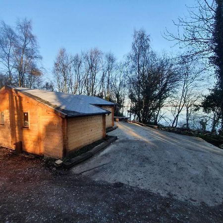 Stunning Log Cabin On The Lake Villa Portroe Eksteriør billede